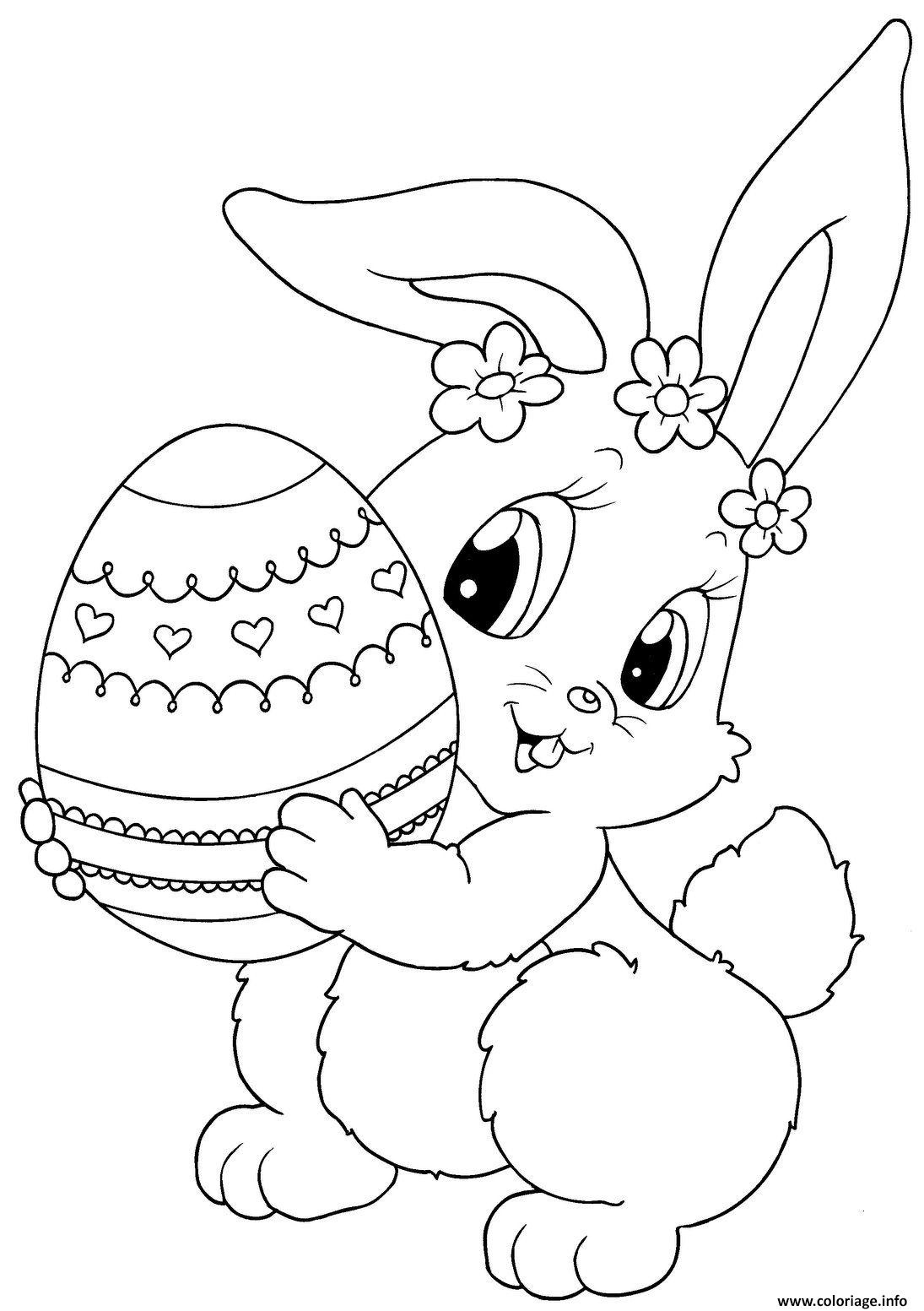 lapin de paques avec un oeuf coloriage dessin